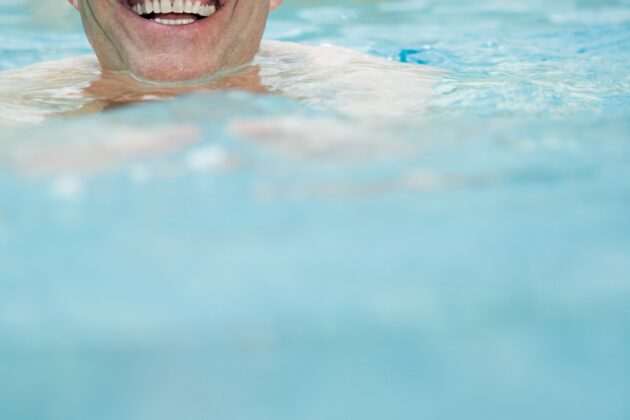 mature man swimming