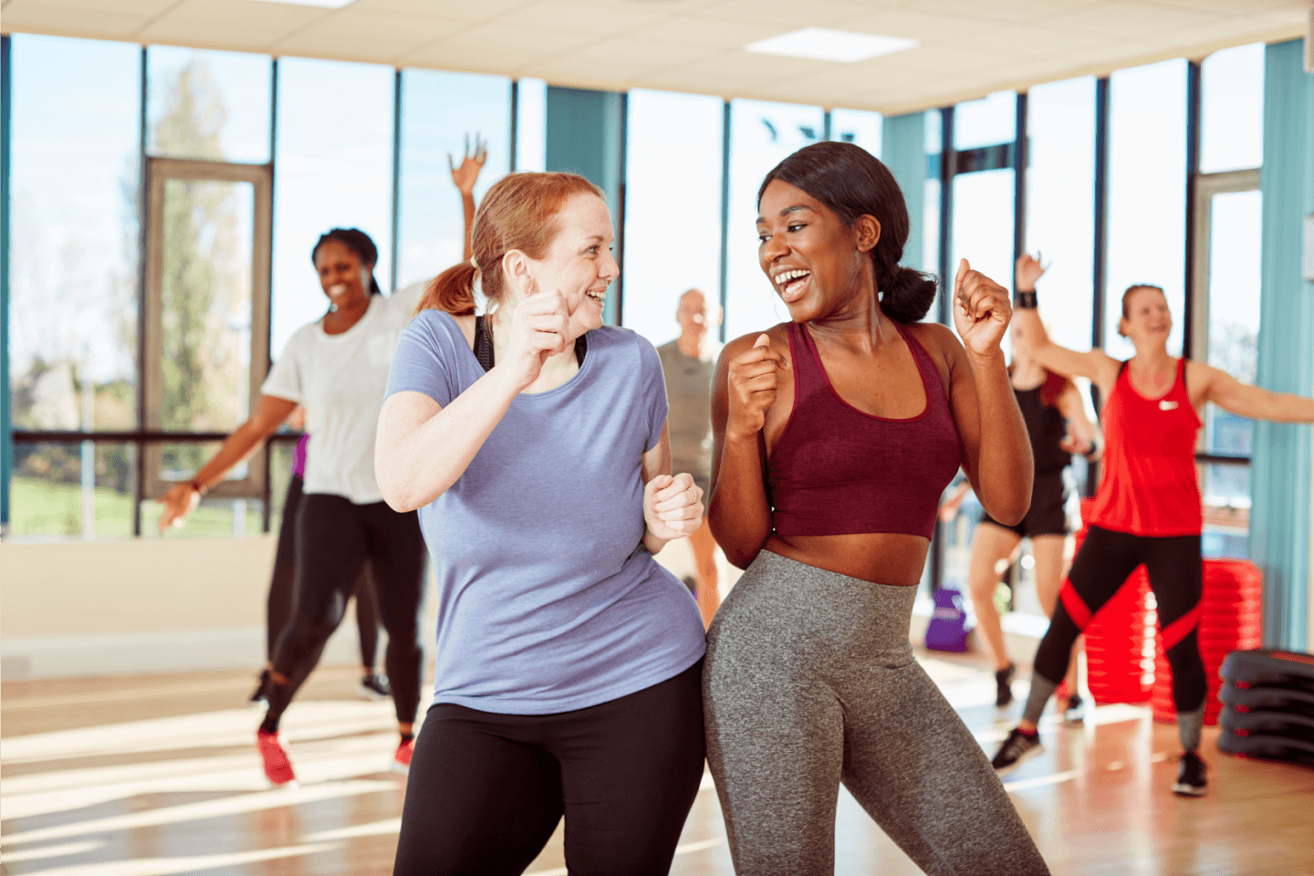 Photo of ladies in an exercise class having fun
