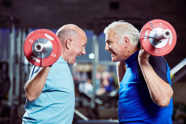 two men lifting weights