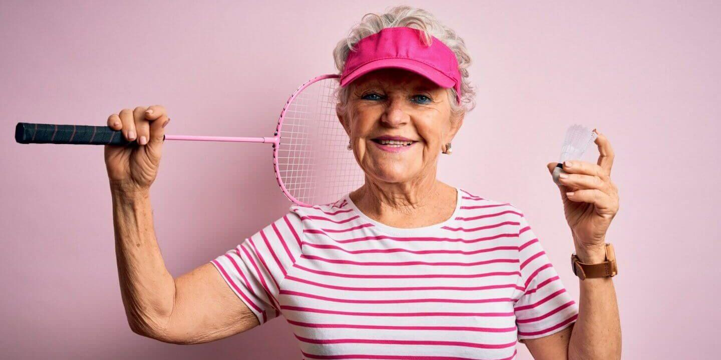 mature woman with badminton racquet