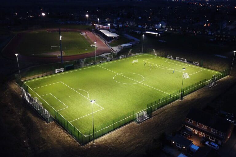 Aerial shot of football pitch at night