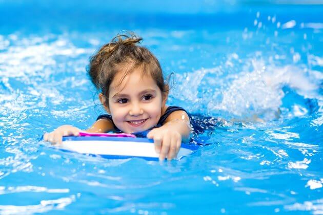 Girl learning to swim