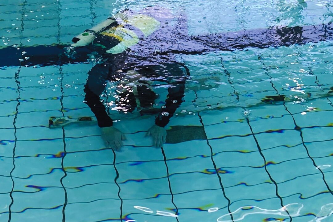 scuba diver in pool