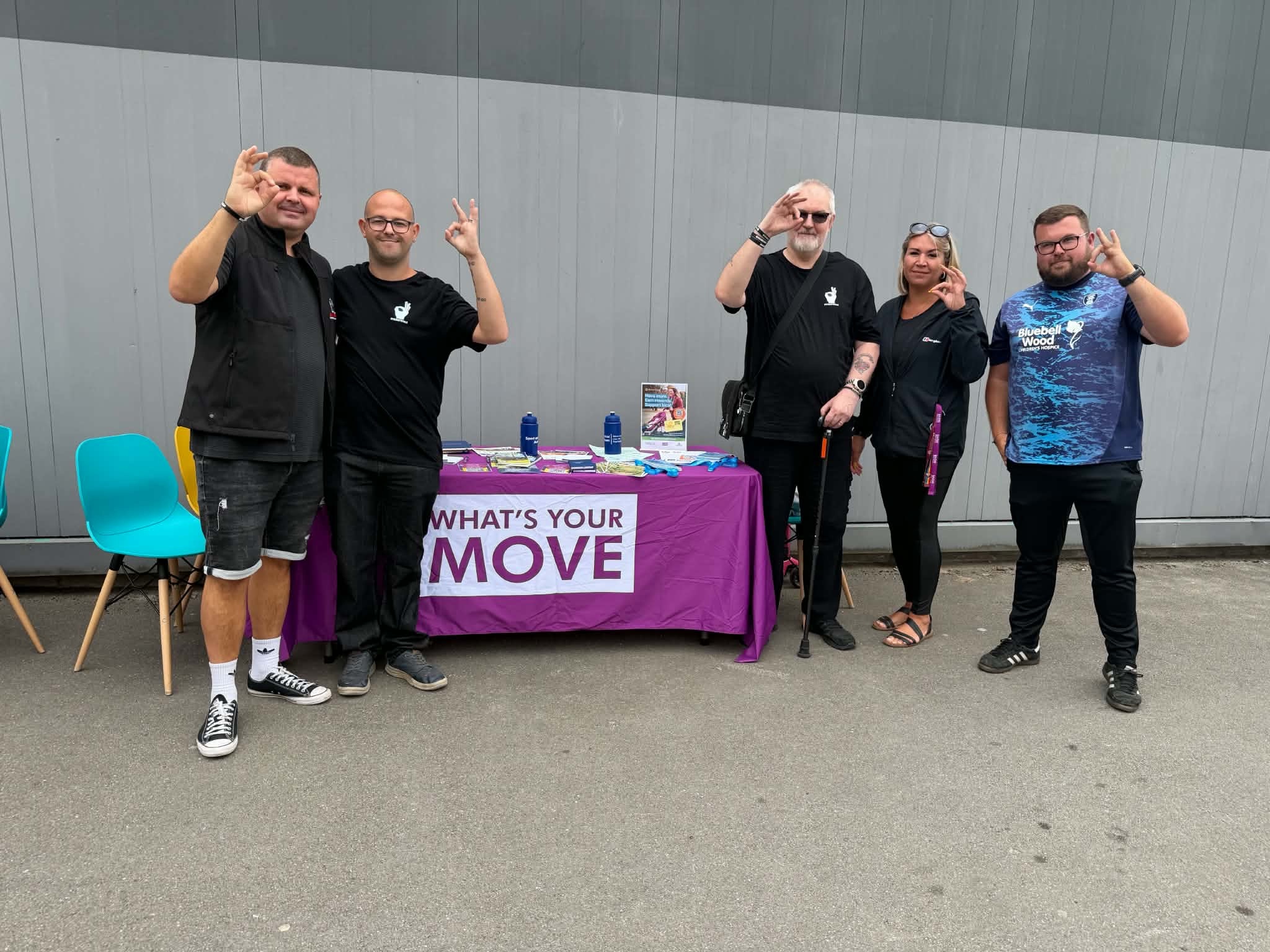 Community representatives at the What's Your Move stall