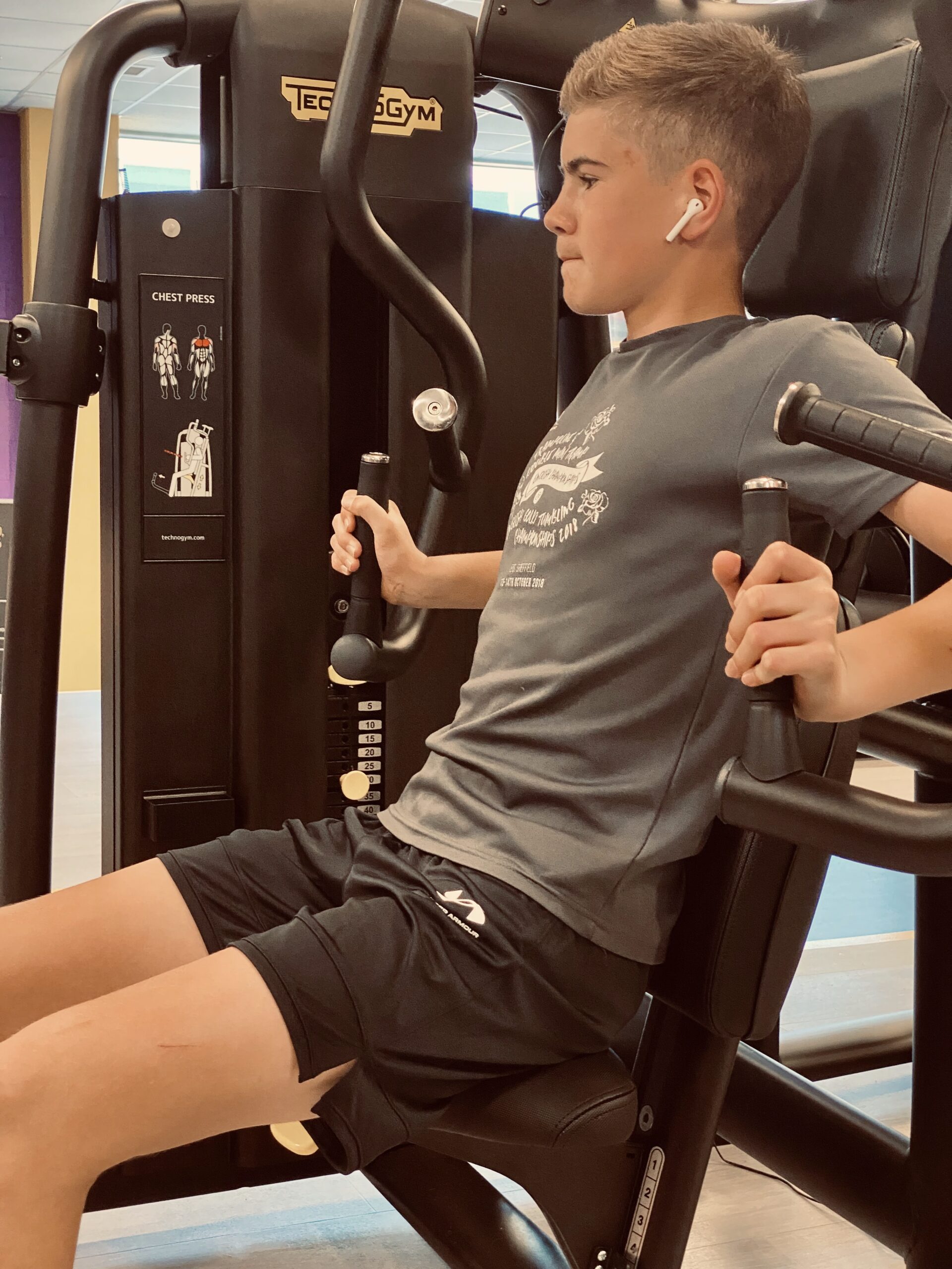 Junior member using gym equipment at Your Space